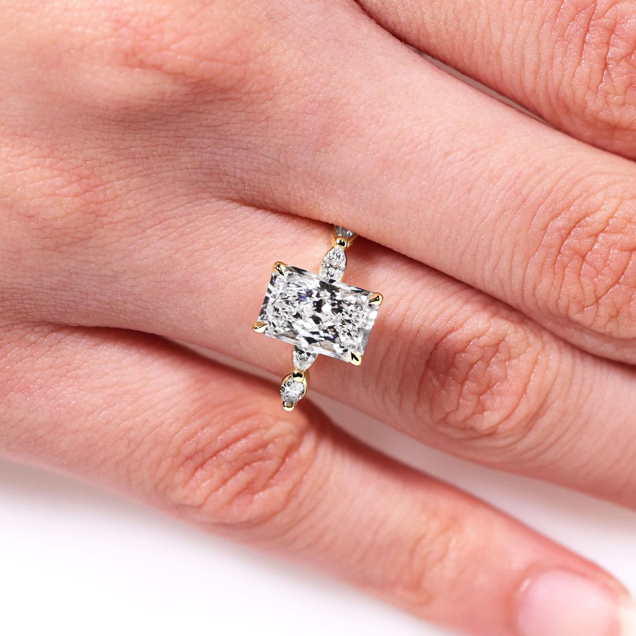 18ct yellow gold 2.31ct radiant and 8=0.50ct marquise cut lab grown diamond engagement ring