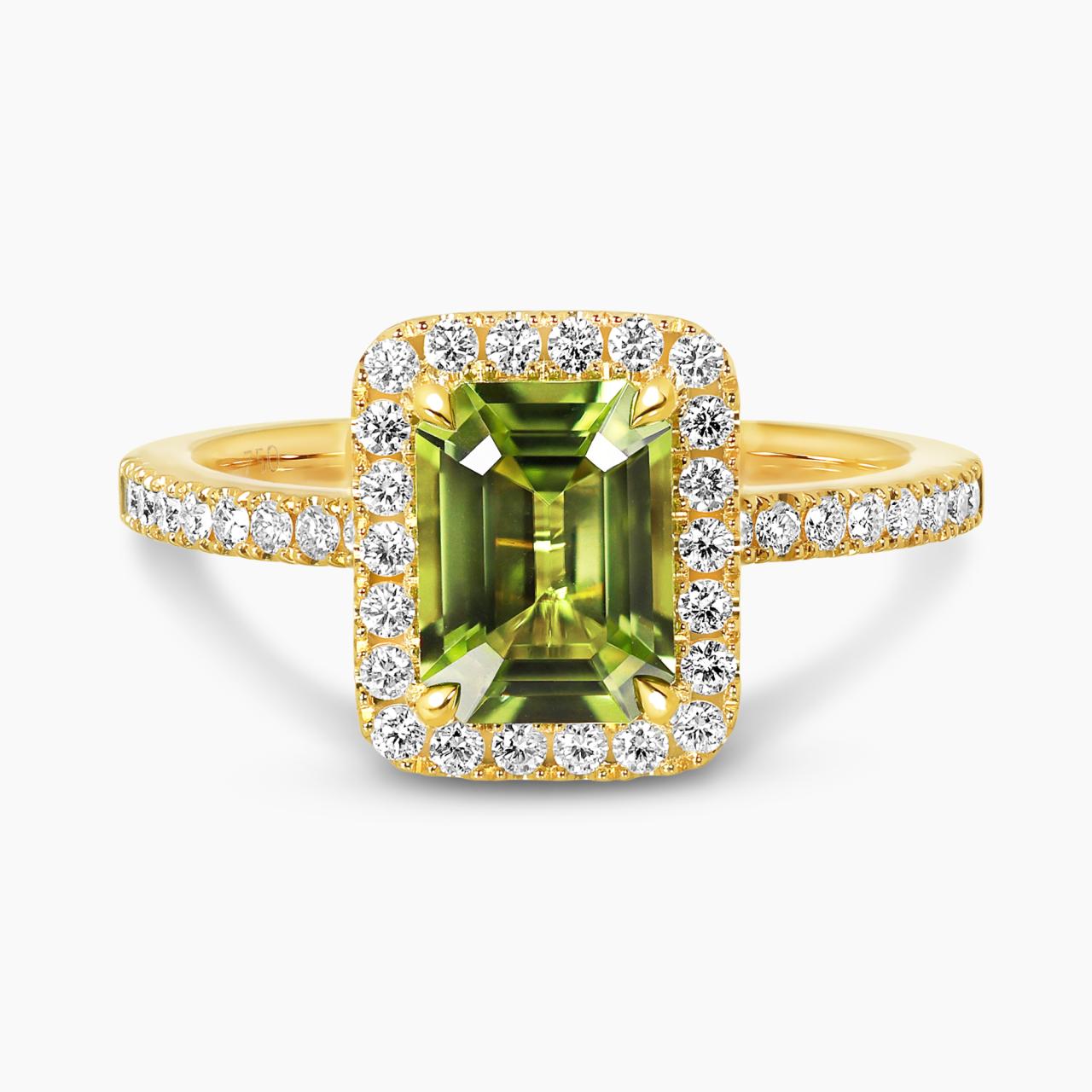 18ct yellow gold 1.46ct emerald cut peridot & diamond dress ring