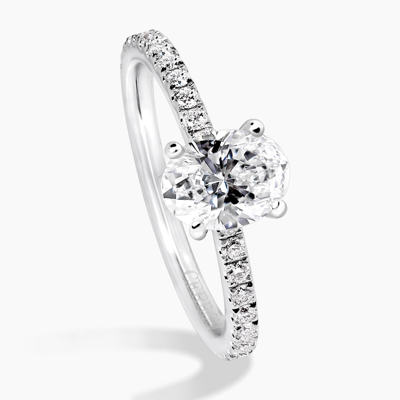 PORTOFINO - 4 CLAW 18ct white gold oval brilliant cut diamond ring with diamond band. GIA Cert