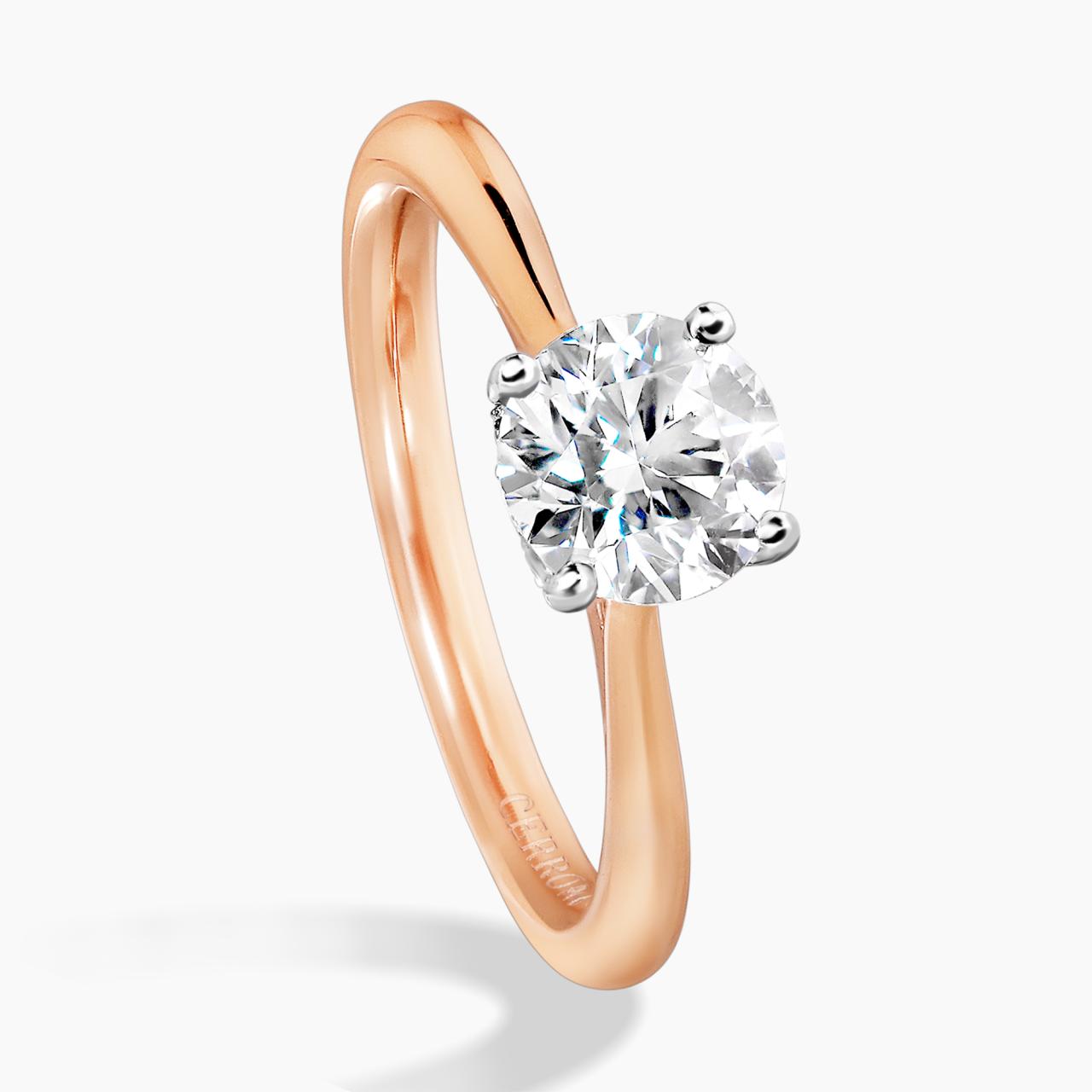 PUGLIA - 18ct rose gold round brilliant cut diamond solitaire engagement ring in a four claw setting with hidden halo. GIA Cert