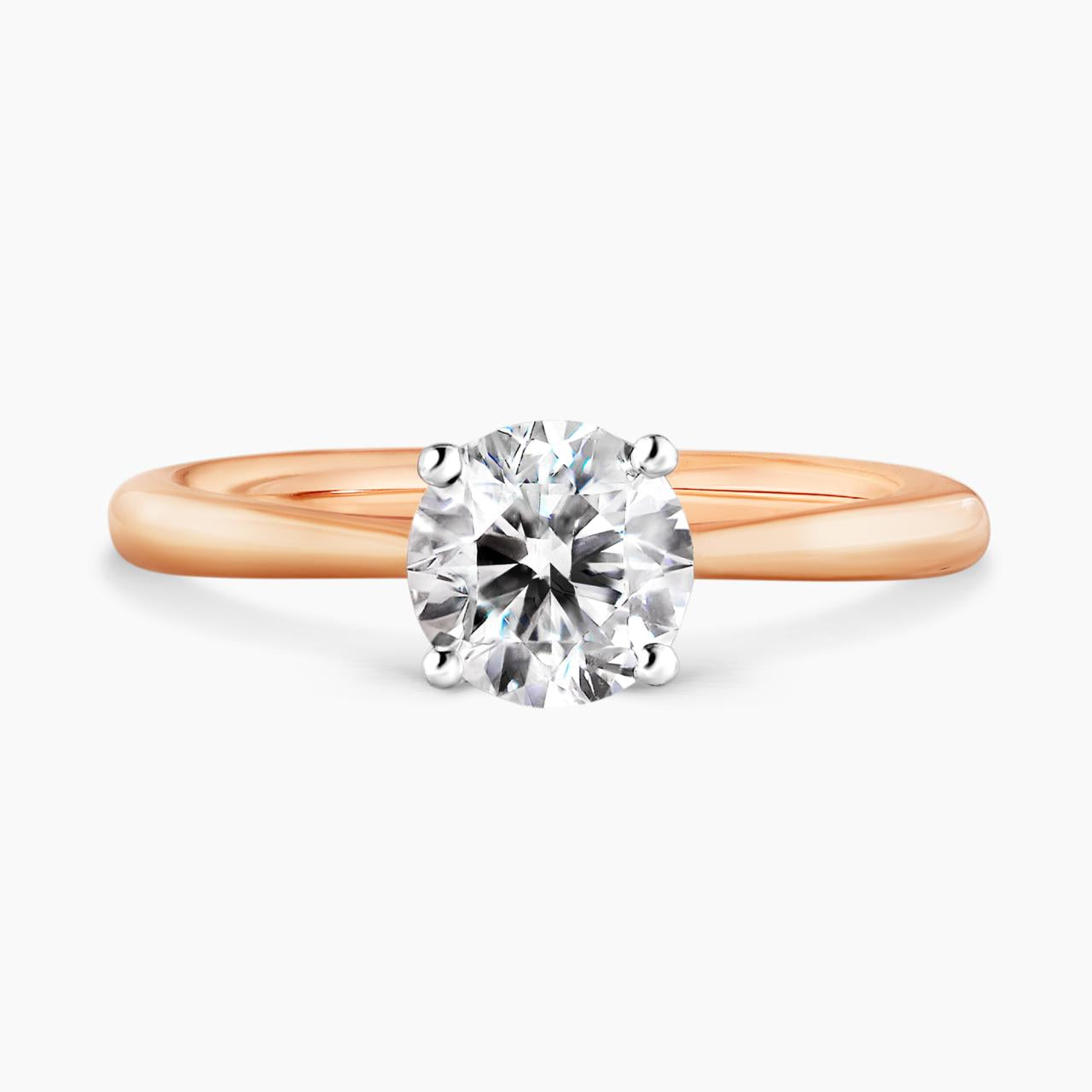 PUGLIA - 18ct rose gold round brilliant cut diamond solitaire engagement ring in a four claw setting with hidden halo. GIA Cert