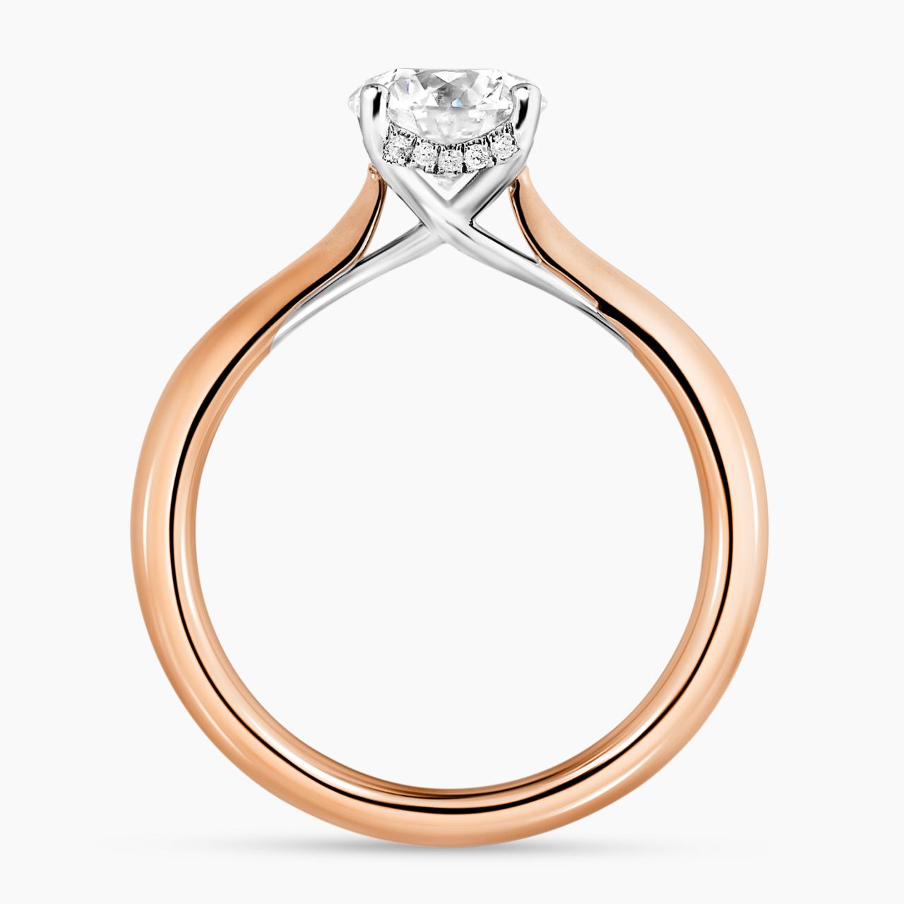 PUGLIA - 18ct rose gold round brilliant cut diamond solitaire engagement ring in a four claw setting with hidden halo. GIA Cert