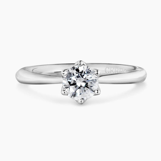 18ct white gold round brilliant cut diamond solitaire ring in a six claw setting