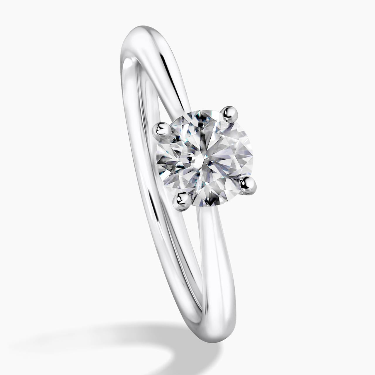 18ct white gold round brilliant cut diamond solitaire engagement ring in a four claw setting. GIA Cert