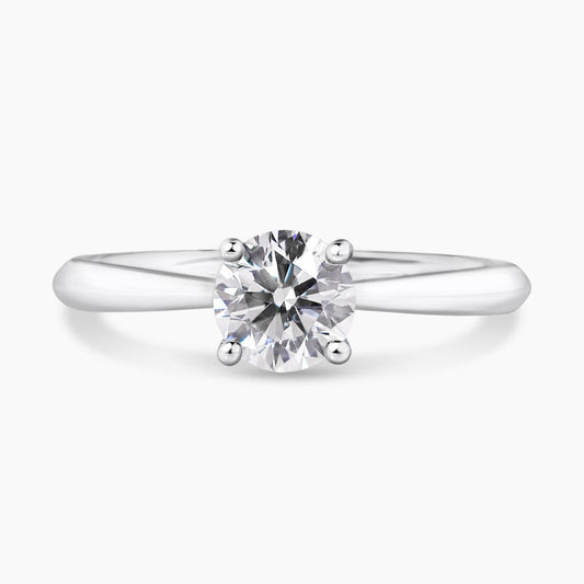 18ct white gold round brilliant cut diamond solitaire engagement ring in a four claw setting