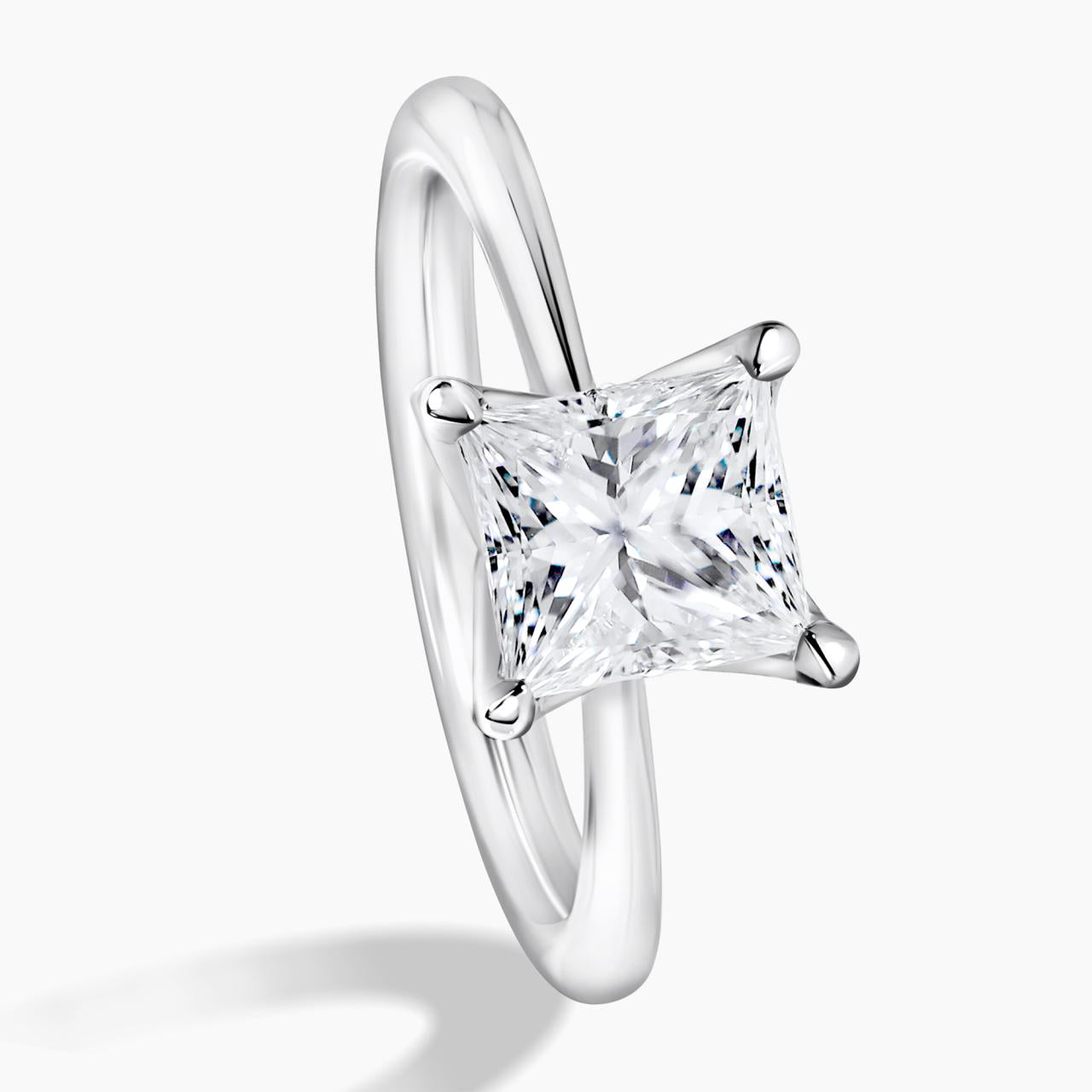 18ct white gold princess cut diamond solitaire engagement ring in a four claw setting. GIA Cert