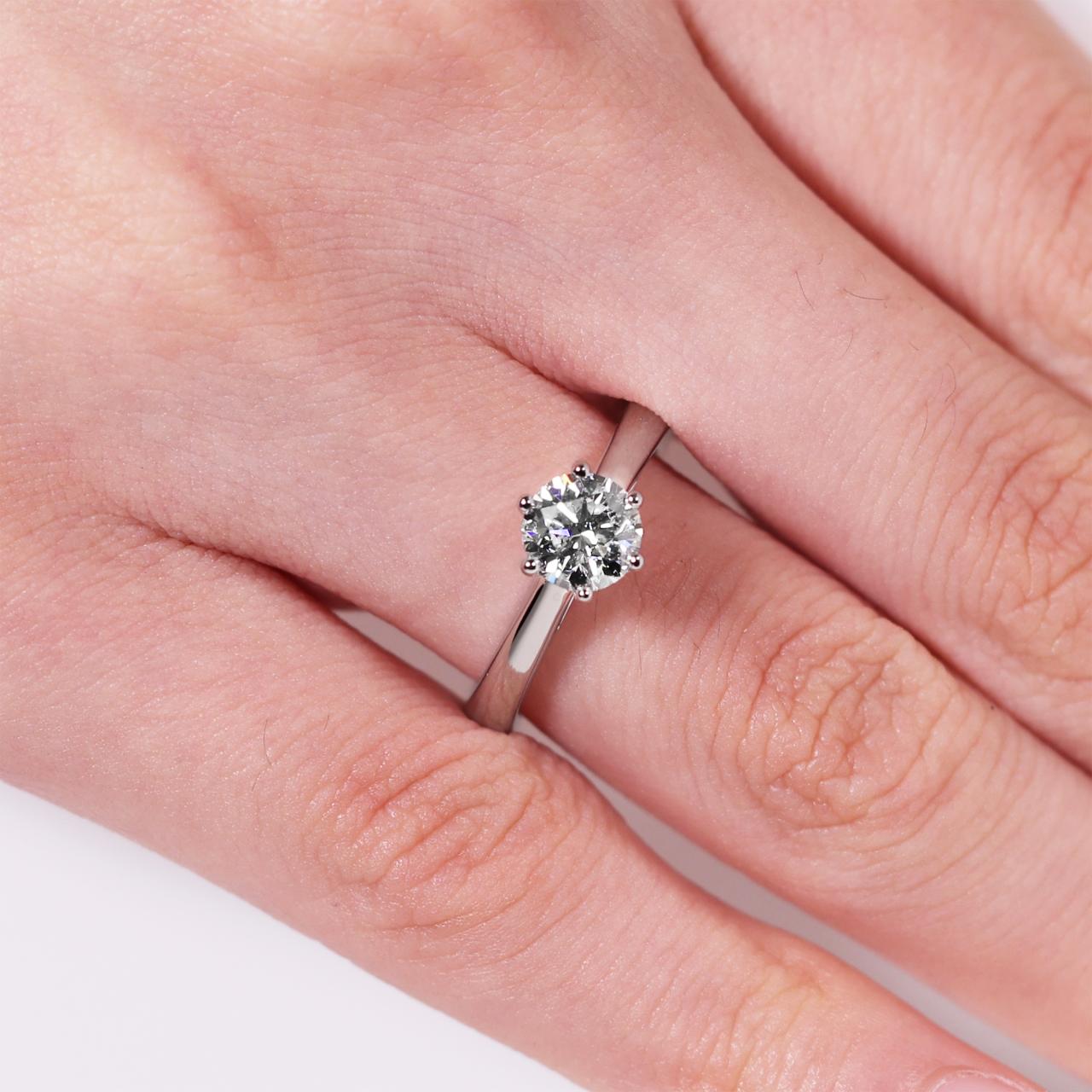 18ct white gold round brilliant cut diamond solitaire engagement ring in a six claw setting. GIA Cert