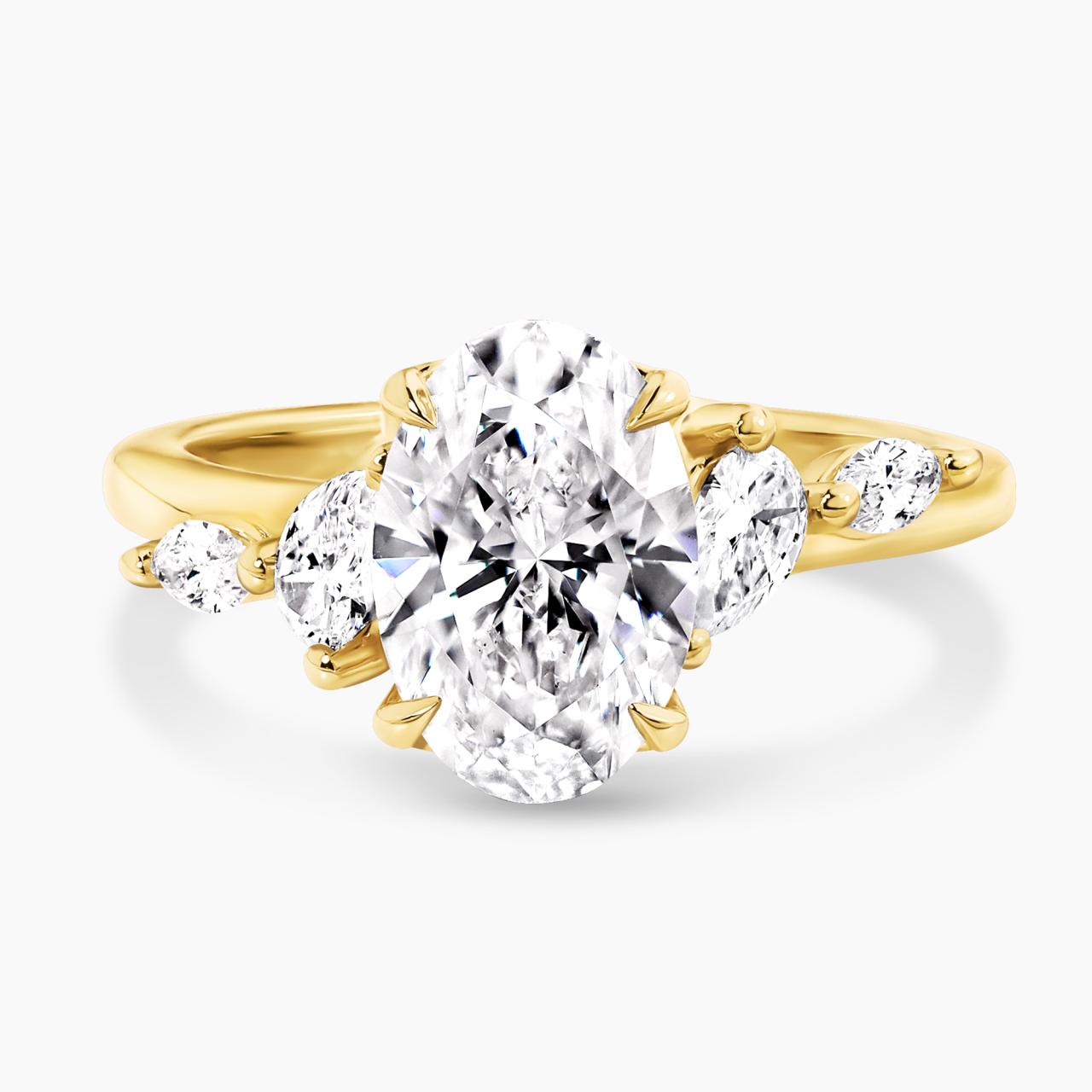 18ct yellow gold 2.00ct D VVS2 oval lab grown diamond ring with pear and marquise shaped lab grown diamonds. IGI Cert