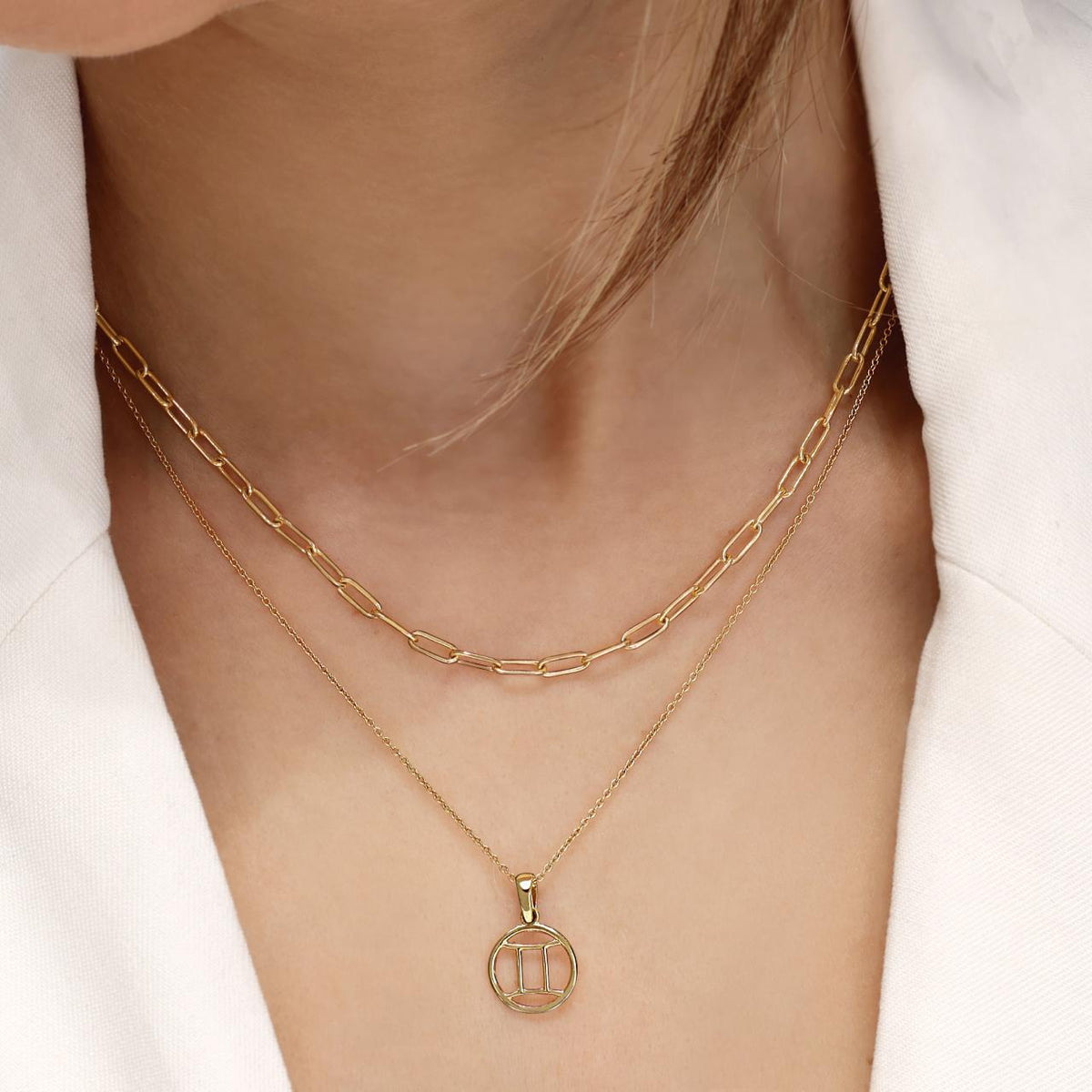 18ct yellow gold Gemini zodiac pendant