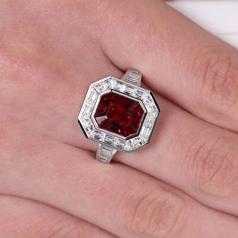 18ct white gold ruby and baguette cut diamonds ring on the finger