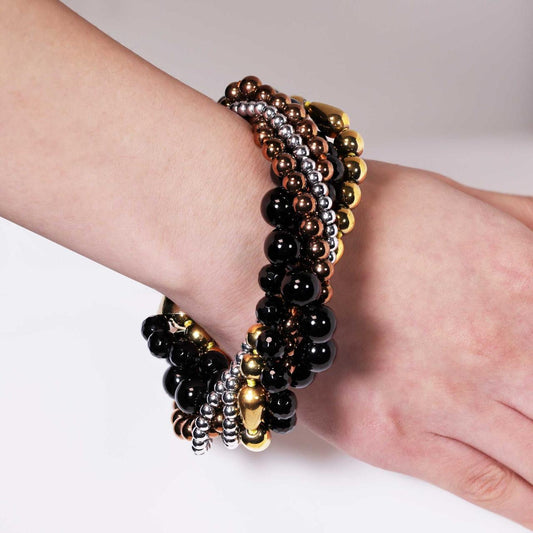 Single row of gold plated agate, two rows of silver plated hemitite, copper plated hemitite and onyx beads bracelet ended with a gold plated magnetic clasp