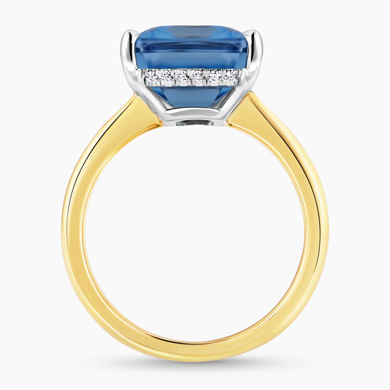 18ct yellow and white gold 8.48ct emerald shape step cut Swiss blue topaz and diamond ring