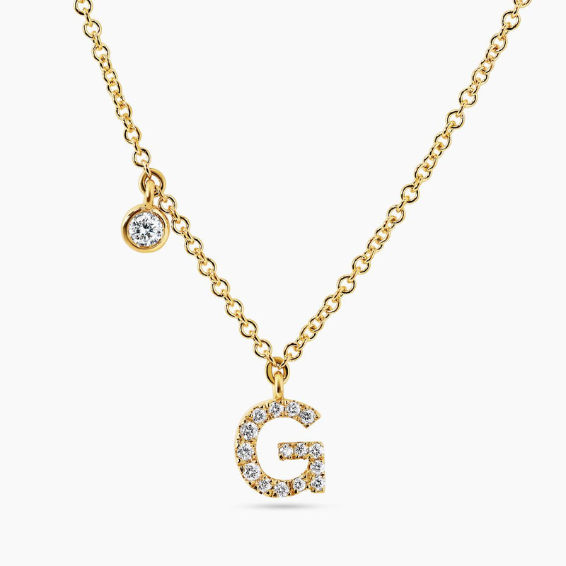18ct yellow gold diamond initial "G" necklace with bezel