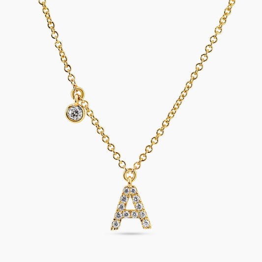 18ct yellow gold diamond initial "A" necklace with bezel diamond