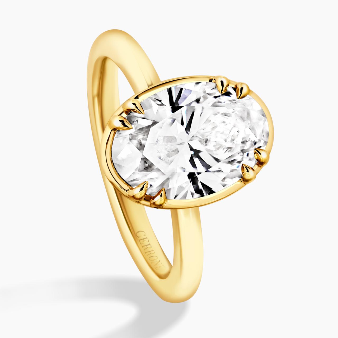 18ct yellow gold 2.56ct D VVS2 oval brilliant cut lab grown diamond solitaire ring in a bezel claw setting IGI Cert
