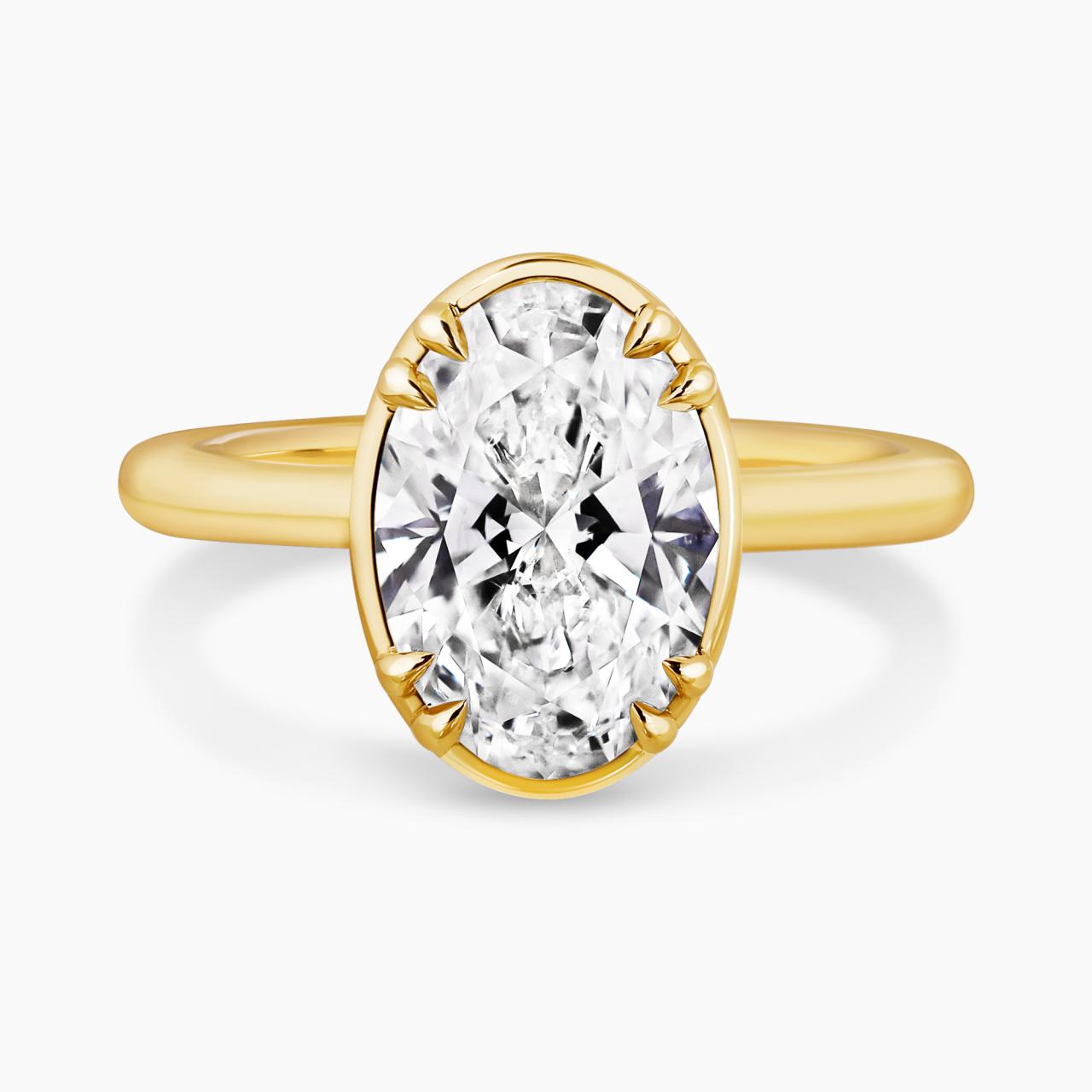 18ct yellow gold 2.56ct D VVS2 oval brilliant cut lab grown diamond solitaire ring in a bezel claw setting IGI Cert