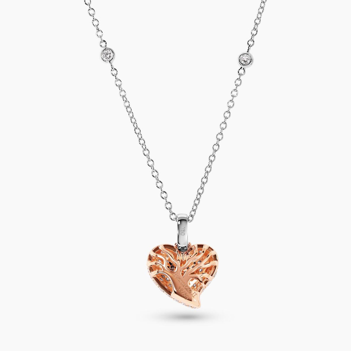 LIMITED EDITION "EVERMORE II" 18ct rose and white gold heart shaped Argyle Pink diamonds set pendant on an 18ct white gold trace chain