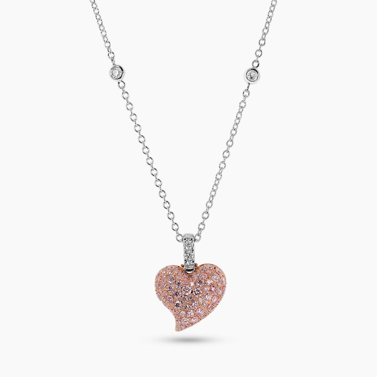 LIMITED EDITION "EVERMORE II" 18ct rose and white gold heart shaped Argyle Pink diamonds set pendant on an 18ct white gold trace chain