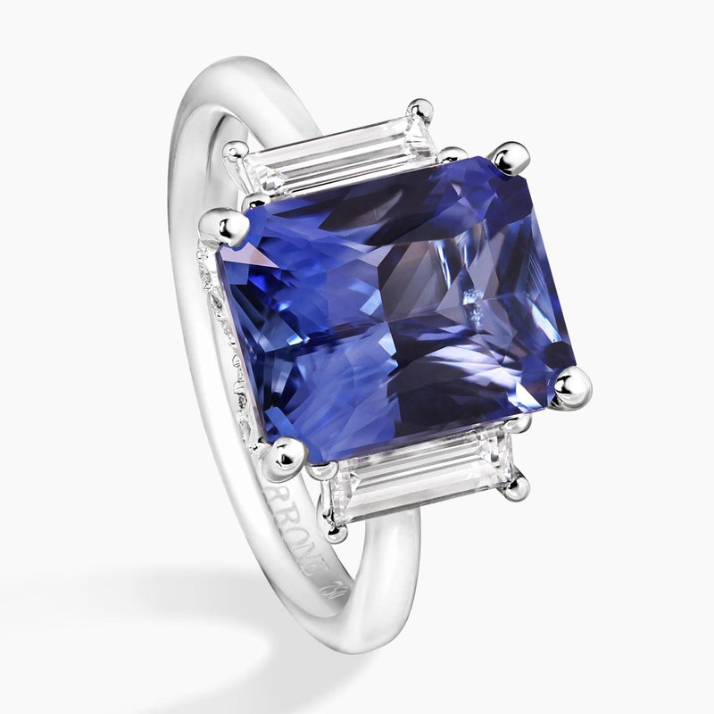 18ct white gold 5.58ct emerald cut Ceylon sapphire and baguette and round cut diamonds ring side view