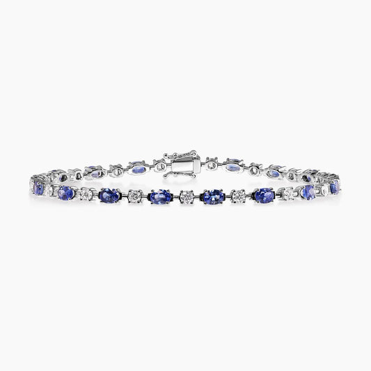 18ct white gold oval Ceylon sapphires and round brilliant cut diamonds tennis bracelet in a four claw setting