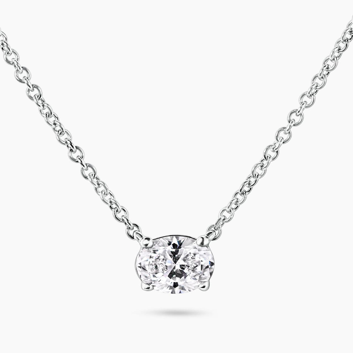 18ct white gold 0.51ct G IF oval brilliant cut diamond necklace in a four claw setting