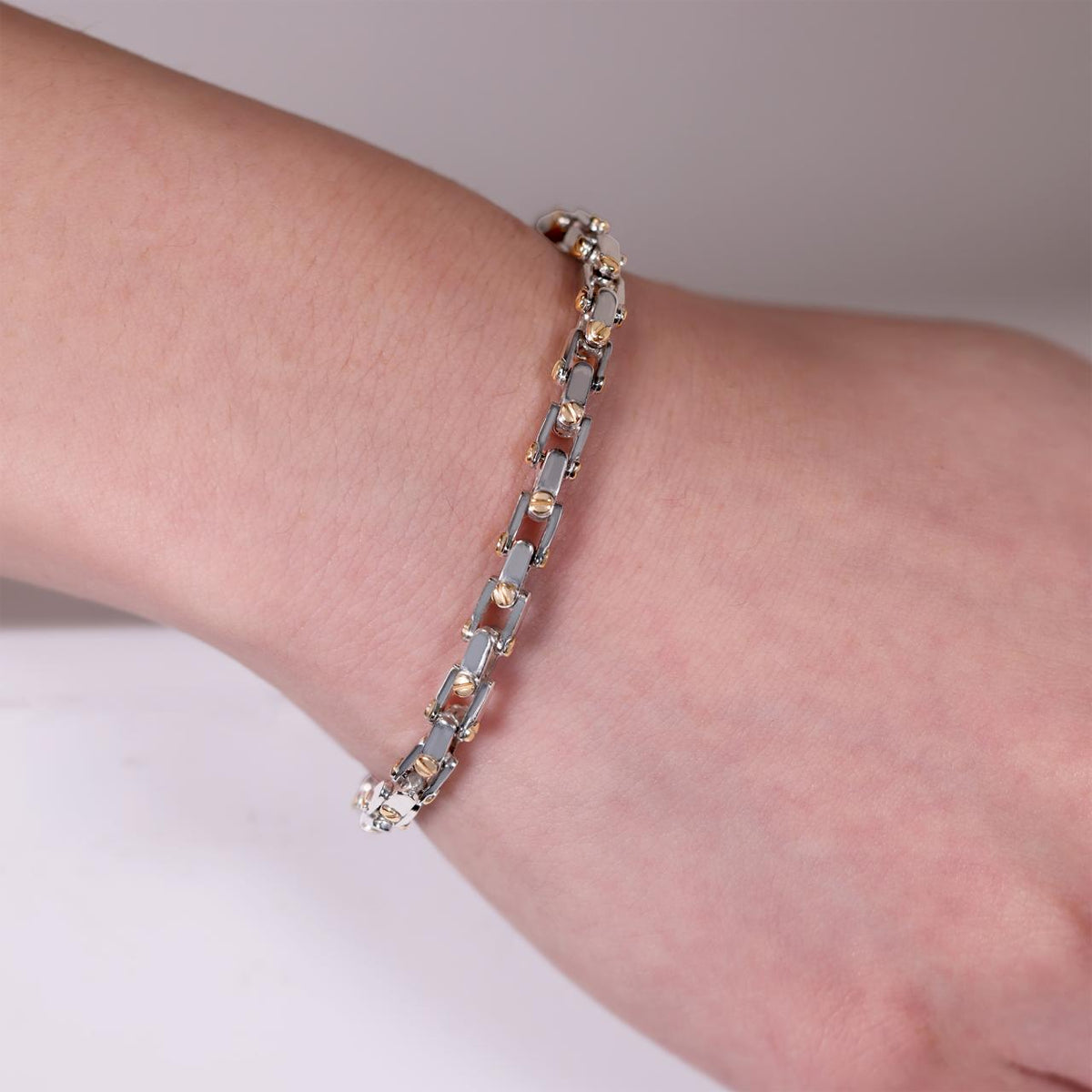 18ct white and yellow gold box link screw detailed bracelet 22cm