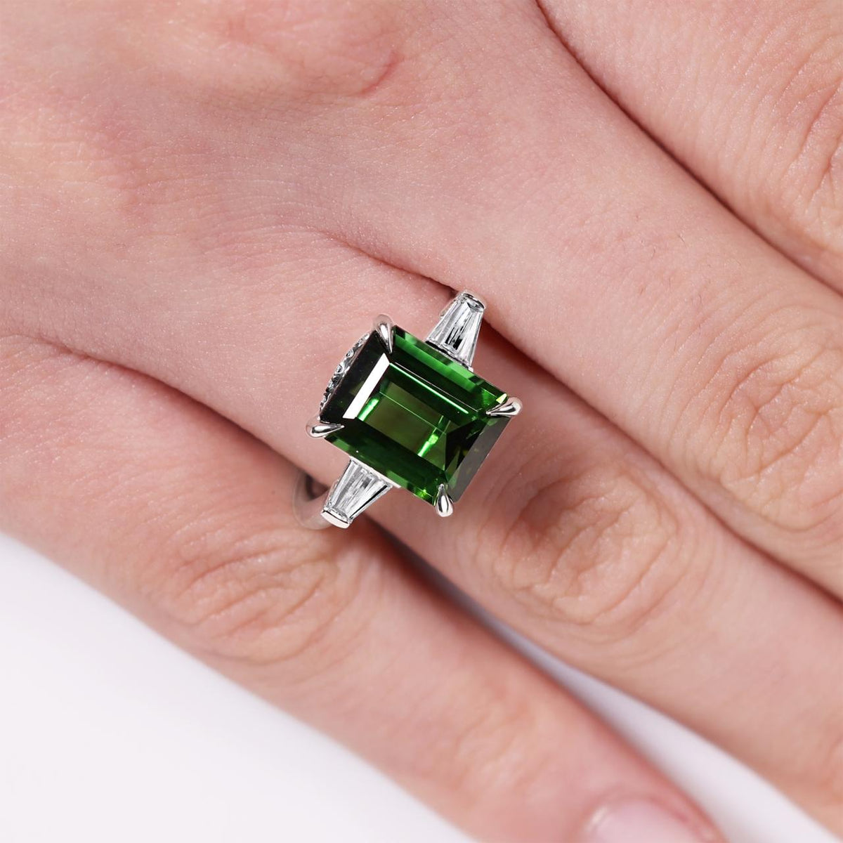 Platinum 4.76ct emerald cut green tourmaline and tapered baguette diamonds ring