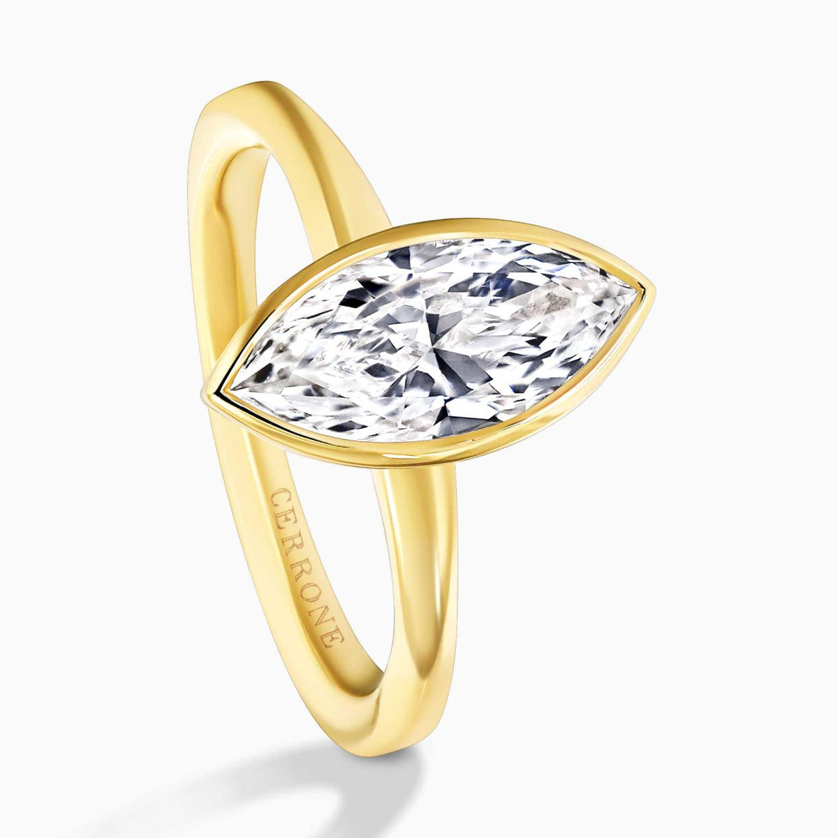 18ct yellow gold 1.75ct E VVS2 lab grown marquise diamond solitaire ring in a bezel setting IGI Cert