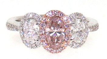 18ct white and rose gold oval argyle pink and white diamond trilogy ring