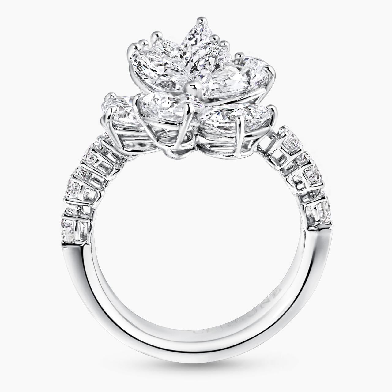 Platinum pear, marquise and round diamond set ladies dress ring