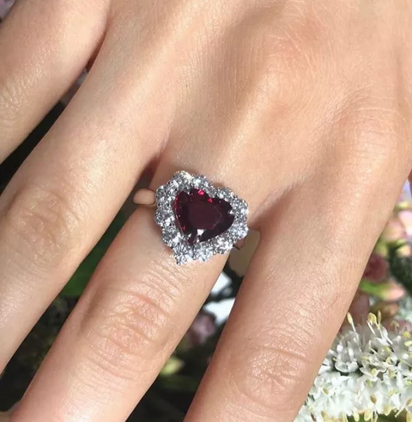 18ct white gold heart shape ruby and round brilliant cut diamond halo ring