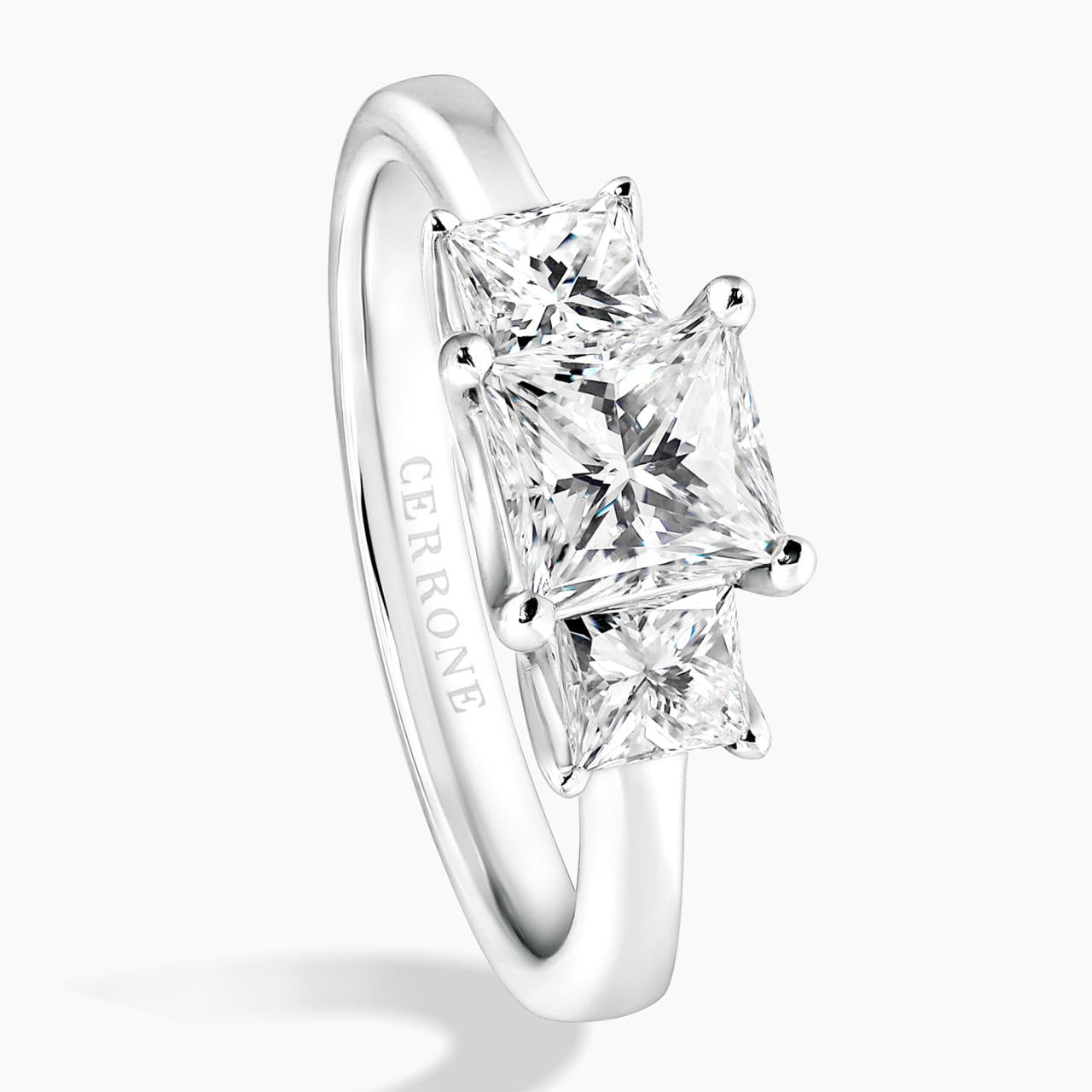 18ct White Gold 3 stone Engagement ring featuring a 1.02ct Princess Cut Diamond in the centre and Princess Cut Diamonds on either side