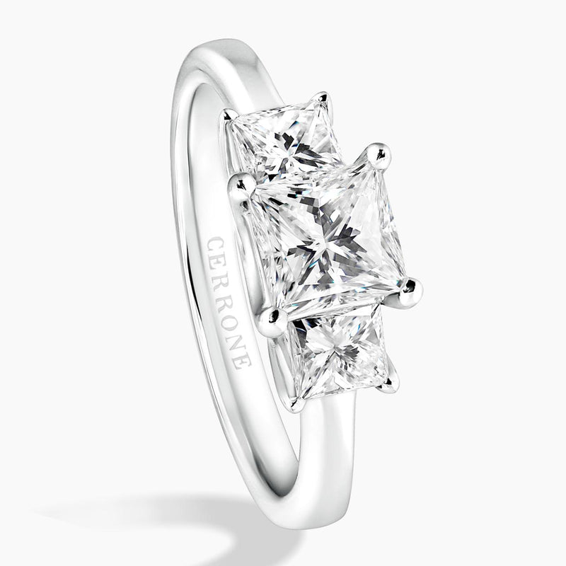 18ct White Gold 3 stone Engagement ring featuring a 1.02ct Princess Cut Diamond in the centre and Princess Cut Diamonds on either side