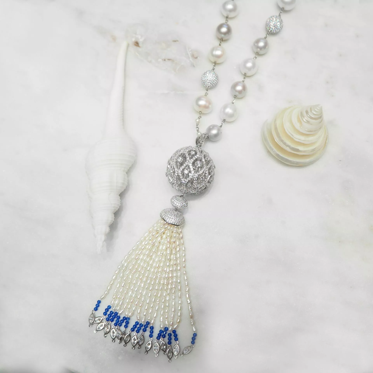 White and silver Freshwater pearls, cubic zirconia balls and blue lapis tassel pendant necklace