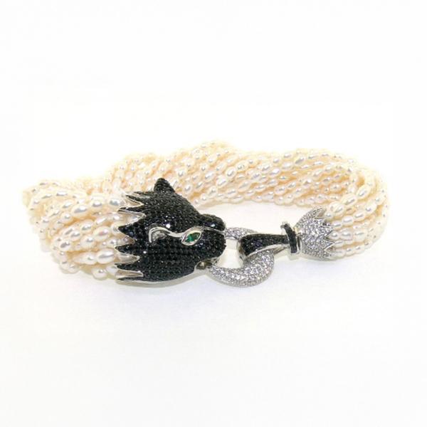 Freshwater pearl bracelet ended with a silver white and black cubic zirconia clasp