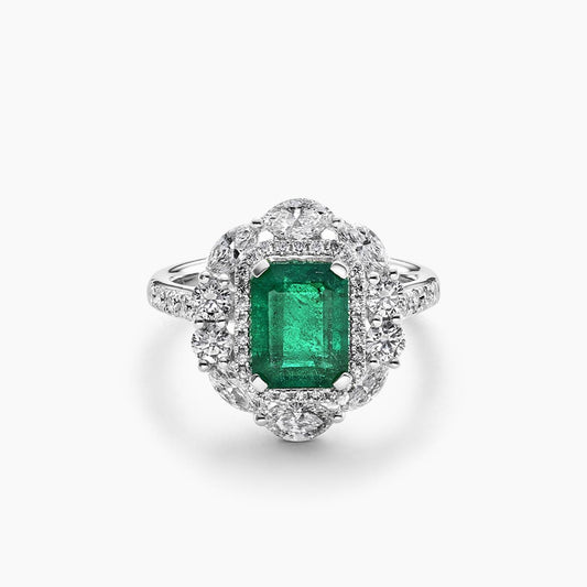 18ct white gold 2.22ct emerald, marquise and round brilliant cut diamond halo ring