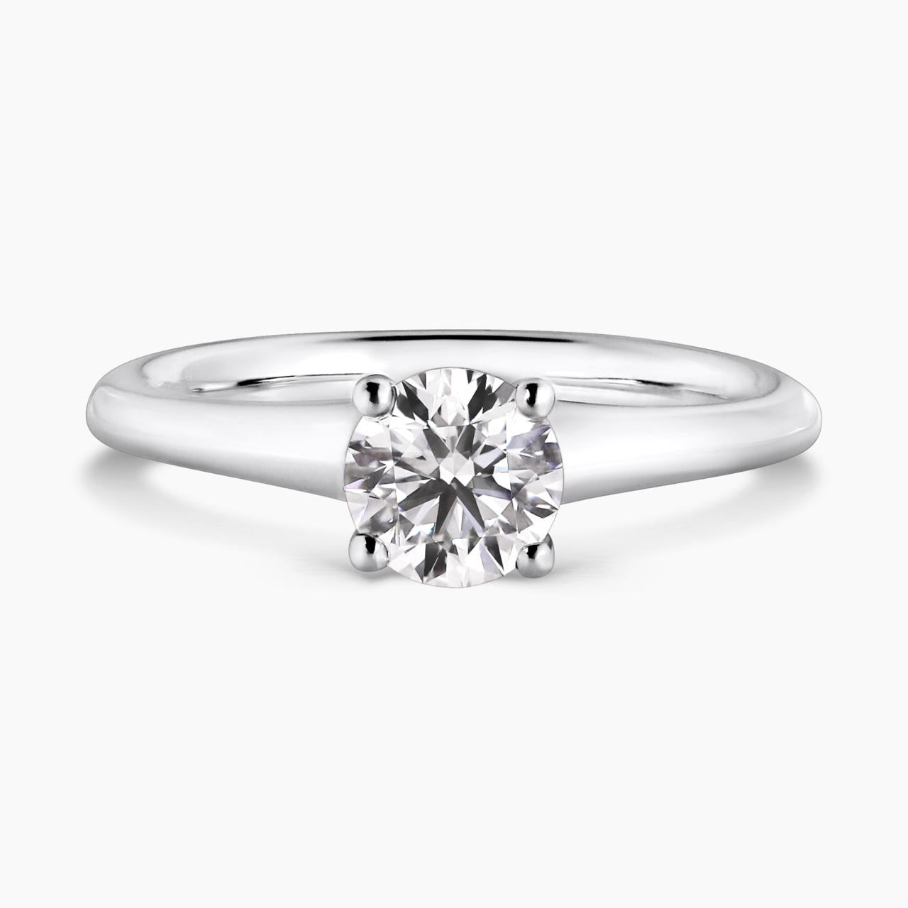 Platinum and rose gold round brilliant cut diamond engagement ring featuring pink round brilliant cut diamonds 