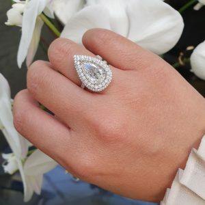 Platinum pear shape diamond ring with double halo