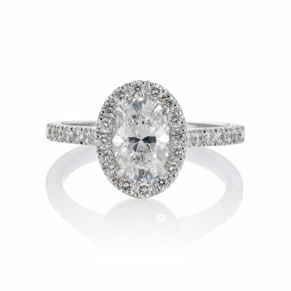 18ct white gold oval diamond engagement ring with halo and diamond band