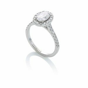 18ct white gold oval diamond engagement ring with halo and diamond band