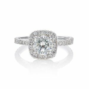 18ct White gold round diamond engagement ring with cushion shape halo