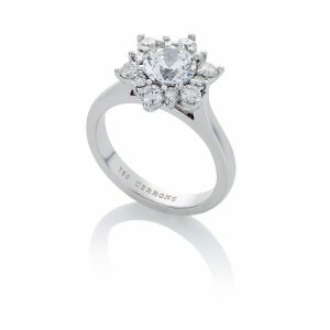 18ct White gold round brilliant cut diamond engagement ring with Snowflake style cluster halo