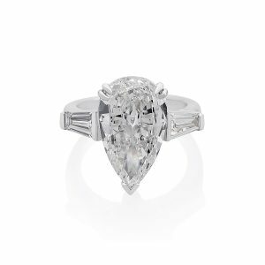 18ct White Gold Pear Shape diamond ring with tapered baguette diamonds on the shoulders.