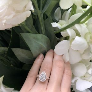 18ct rose and white gold 0.56ct F VS2 pear shape diamond ring with halos and split band
