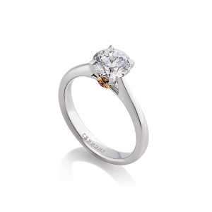 Platinum and 18ct rose gold round brilliant cut diamond ring