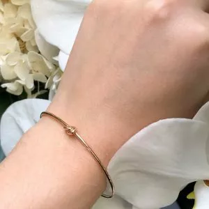 18ct rose gold knot bangle