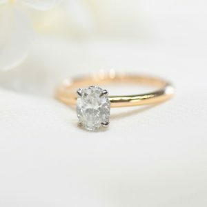 18ct rose and white gold 0.80ct F SI1 oval diamond ring