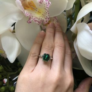 18ct white gold emerald cut green tourmaline and diamond ring