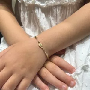 18ct yellow gold baby bracelet with an angel medal