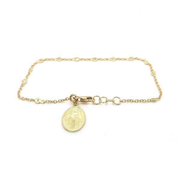 18ct yellow gold diamond bracelet with religious medal